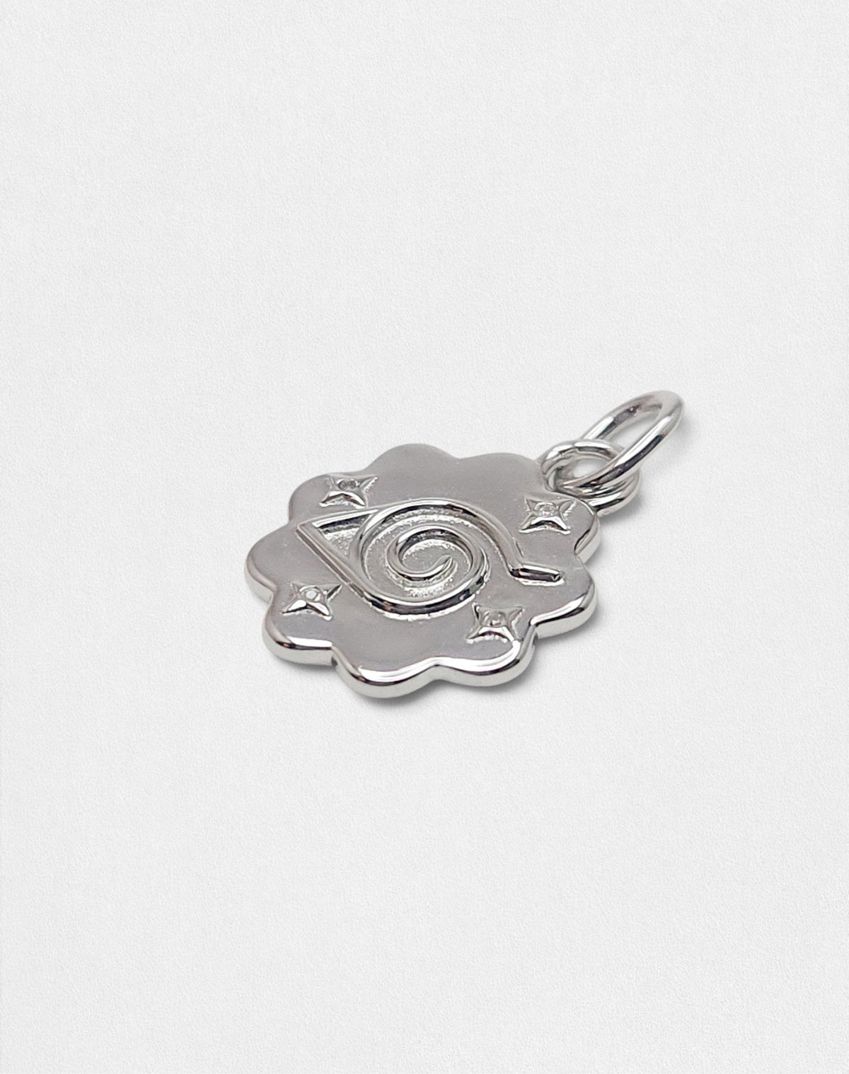 Side angle of the Konoha Hidden Leaf charm, highlighting the polished 925 sterling silver finish and the depth of the zirconia stone settings.